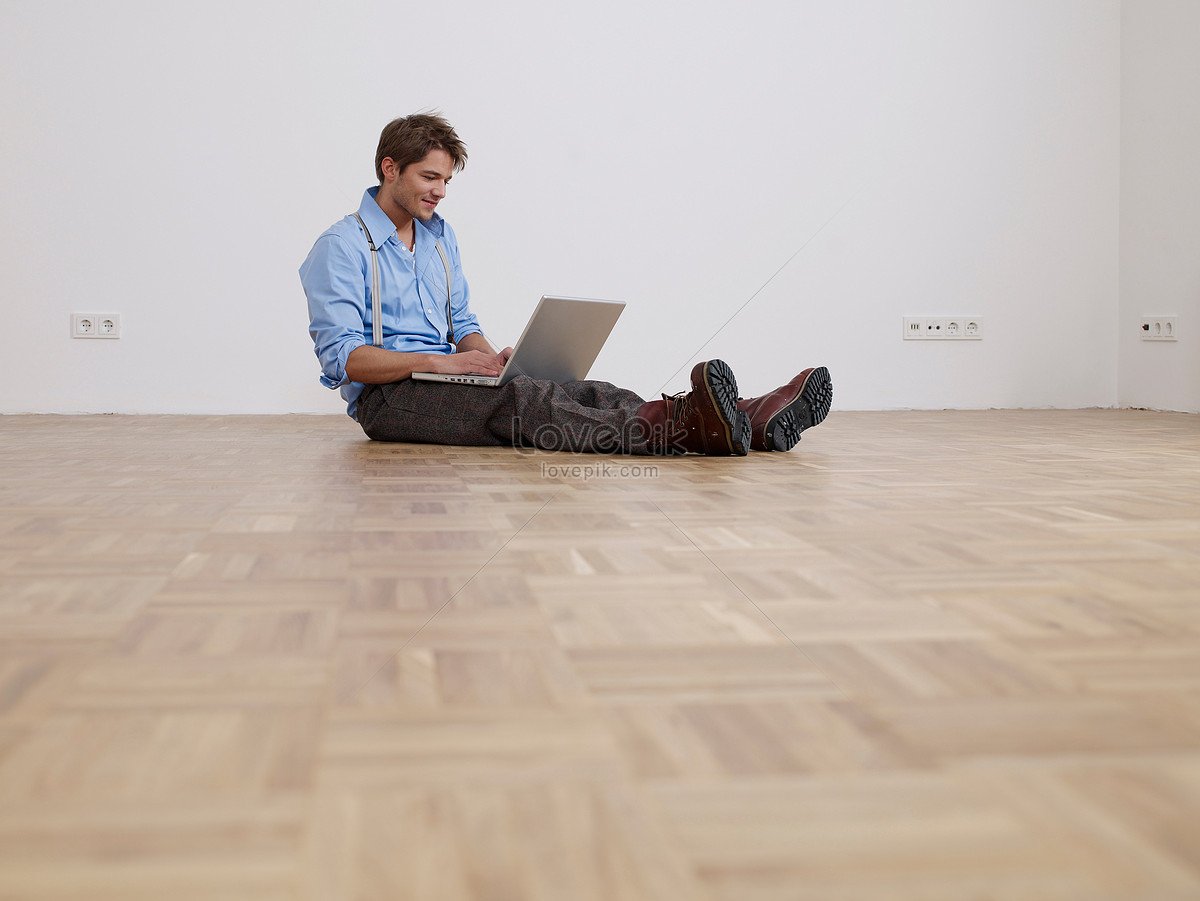 Man Sad in empty Flat.