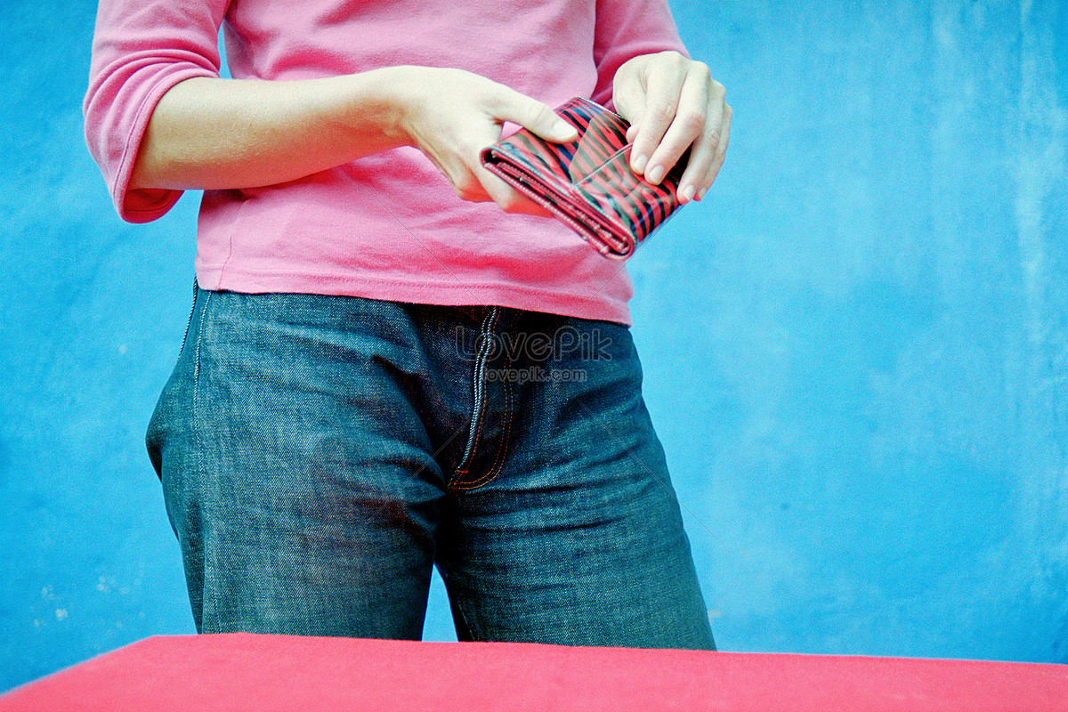 Rear View Of Woman Holding Purse And Standing Stock Photo - Download Image  Now - 2015, 30-39 Years, 35-39 Years - iStock