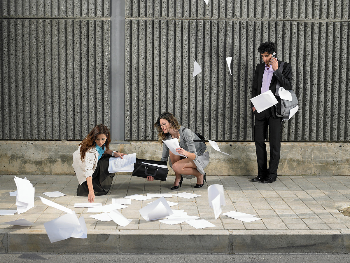 Друзья встретились через 5. Young woman picked up papers.