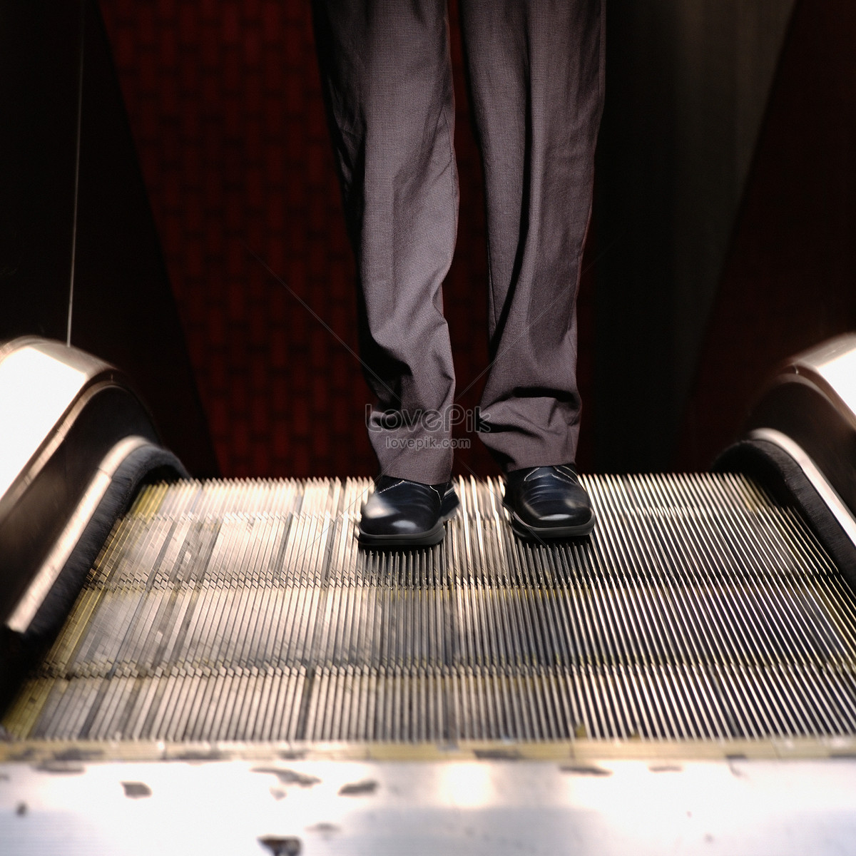 Clown Throwing Pie On Escalator