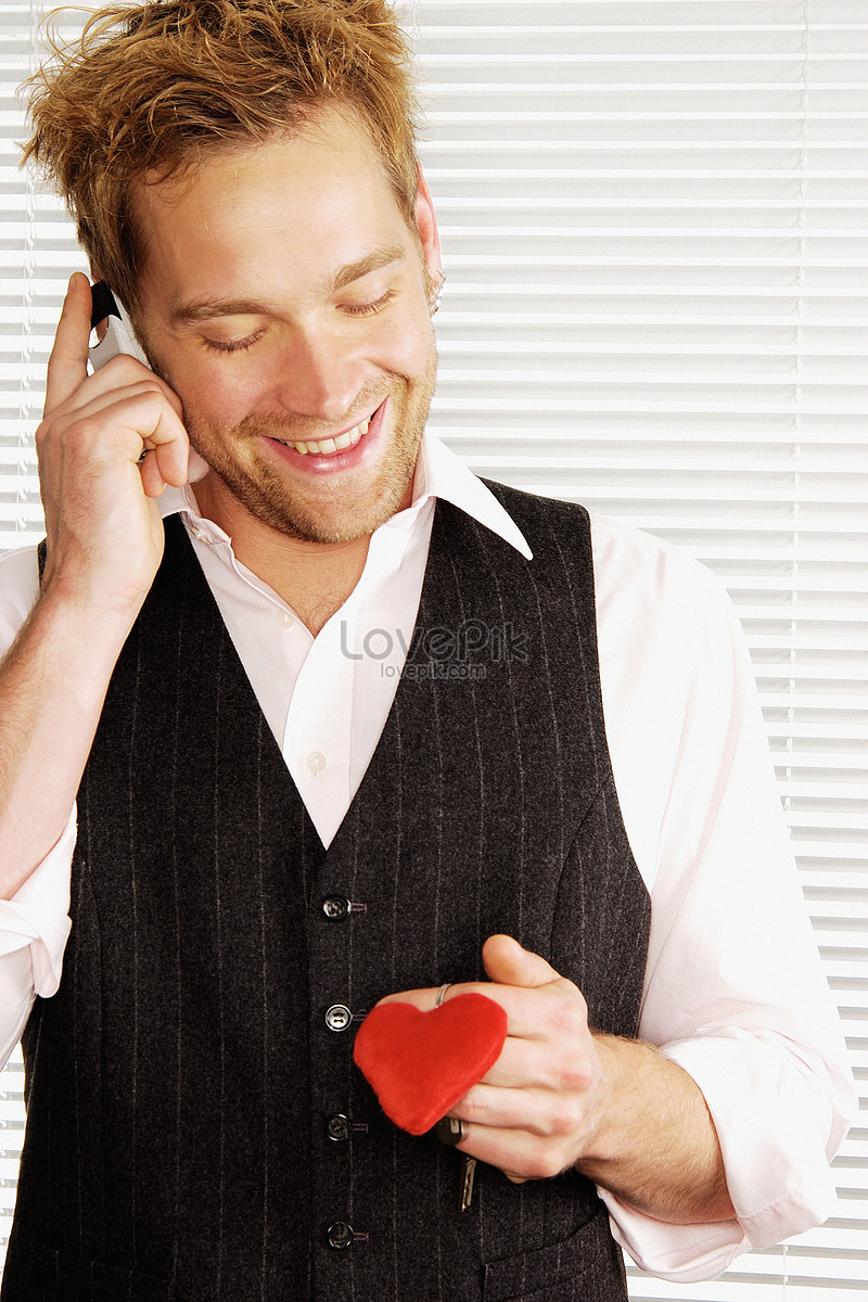 Smiling Man Holding Heart Shaped Key Ring Picture And HD Photos | Free ...