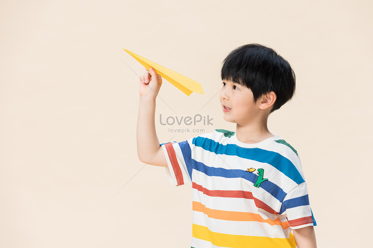 Cute Little Boy Throwing Paper Plane Picture And HD Photos | Free ...