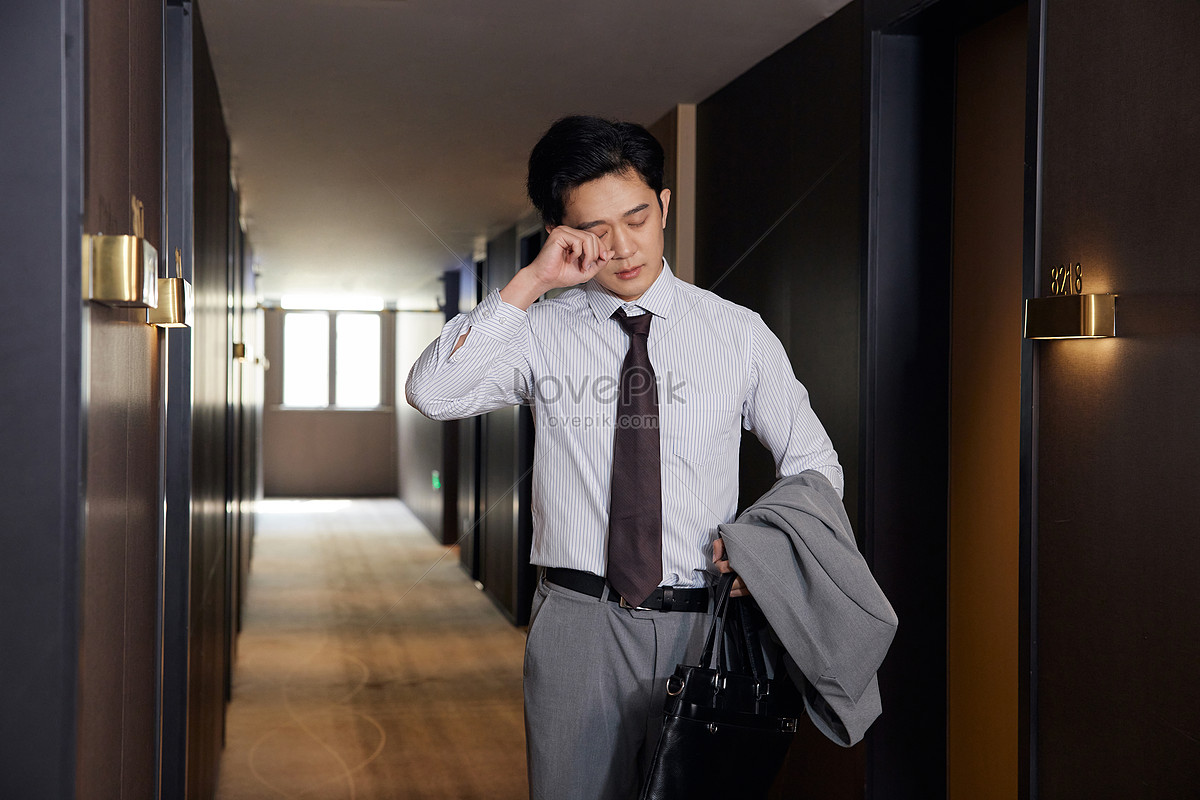 A man on a business trip returns to the hotel exhausted, male, overworked, trip HD Photo