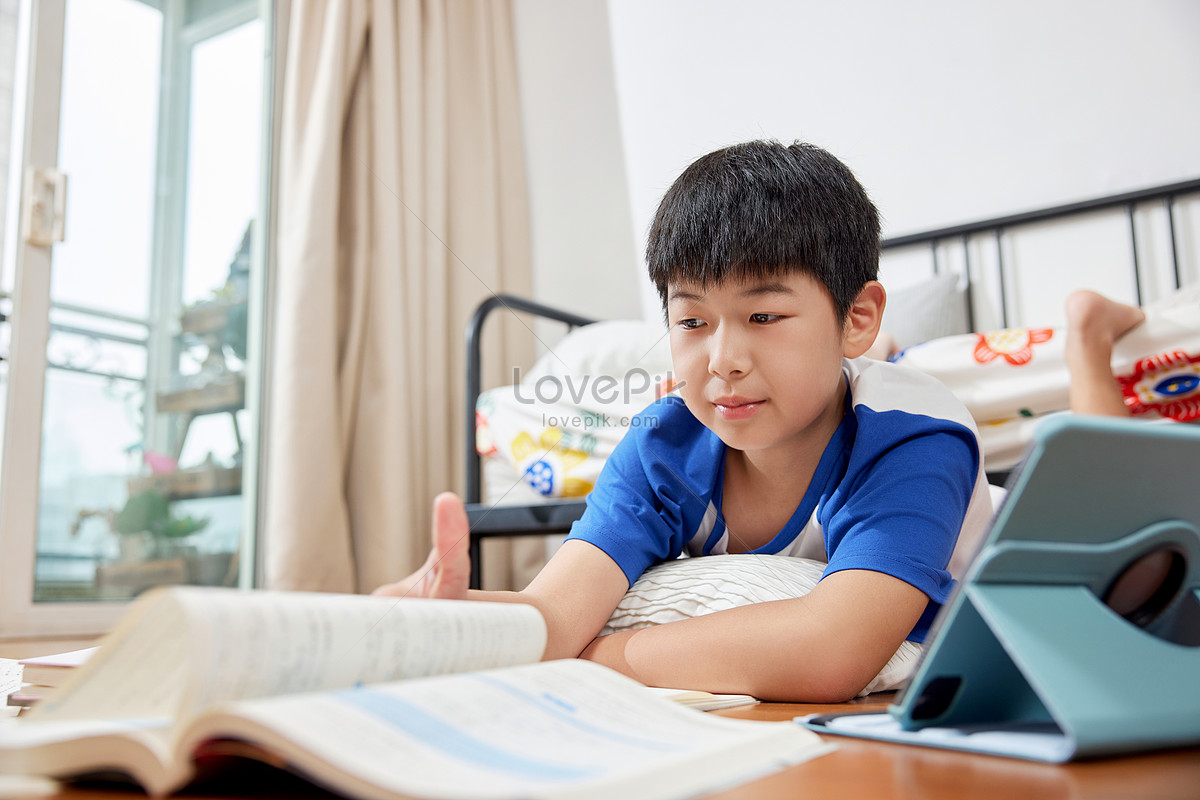 Children doing homework during summer vacation Photo