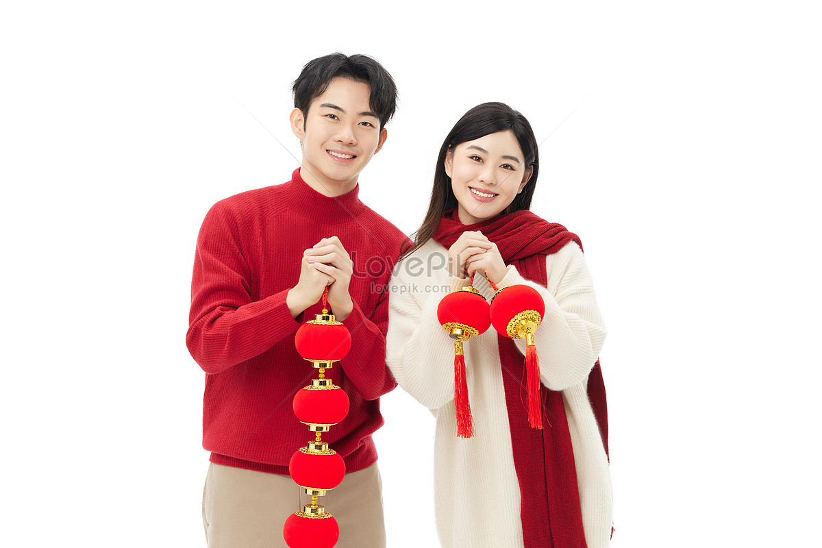 Young Couple Holding Lanterns To Celebrate New Year Picture And Hd 