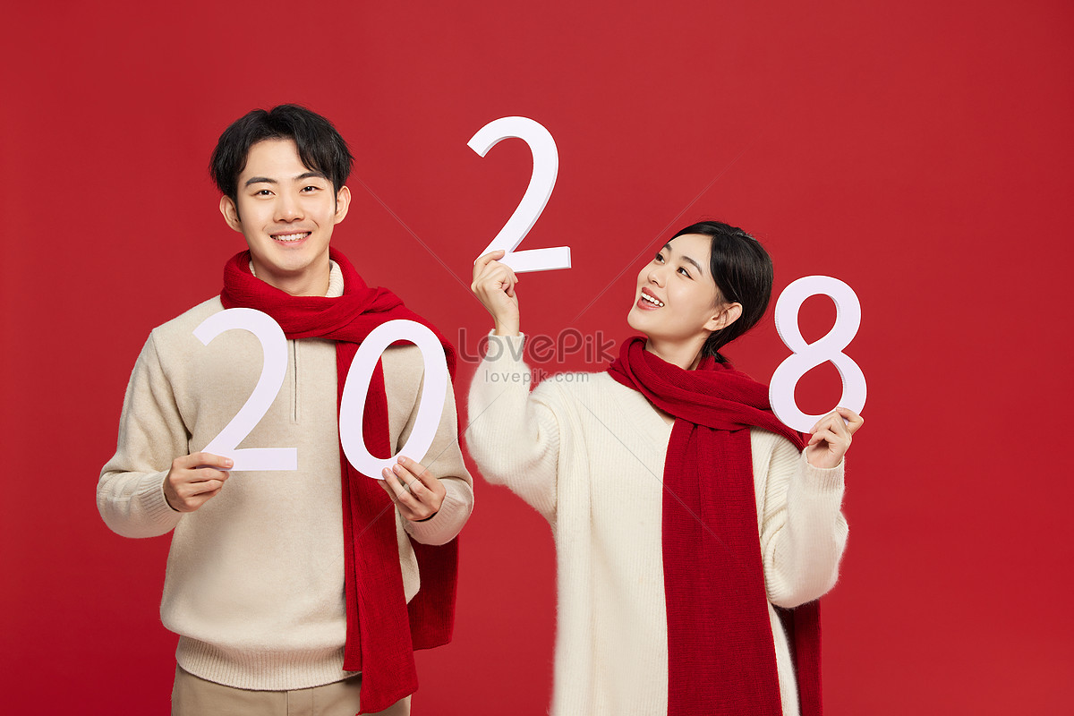 Young Couple Smiles To Welcome 2028 Picture And HD Photos | Free ...